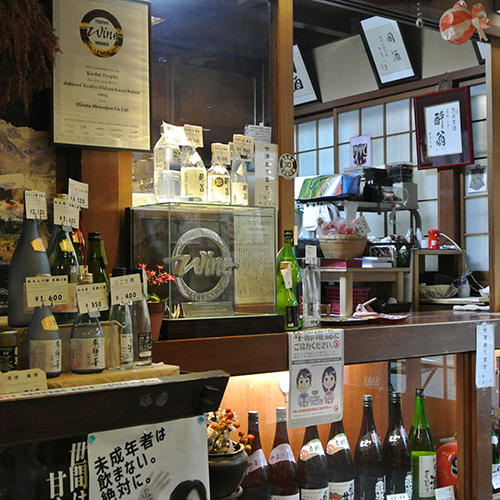 register area with sake bottles on display